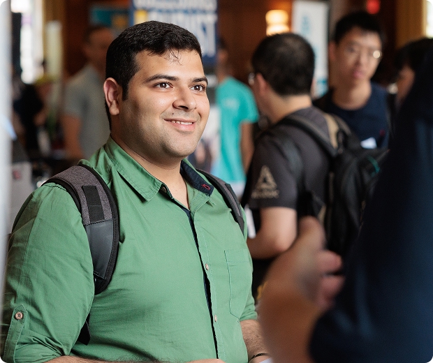 Smiling student listening