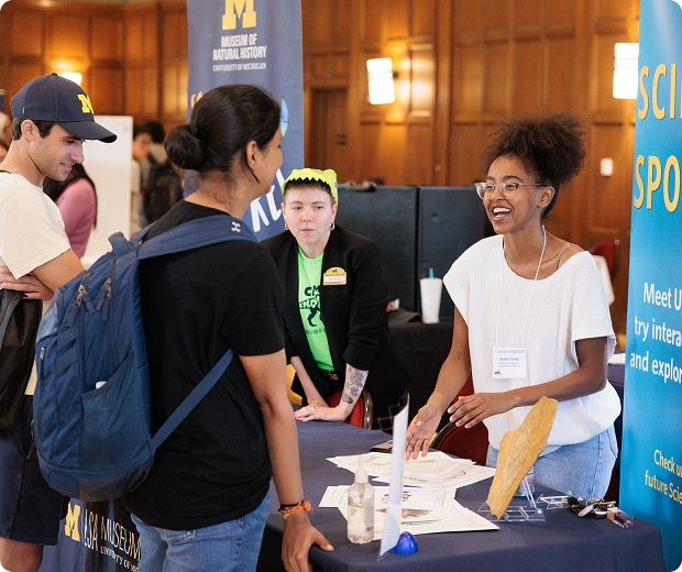 Students at FestiFall talking about engagement opportunities